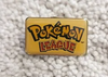 Pokemon League - Enamel Pin - Nintendo and Wizards of the Coast 1999