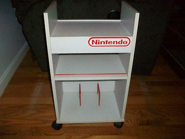 NES Roll Cart - white stand with wheels with nintendo logo near the top and 3 levels
